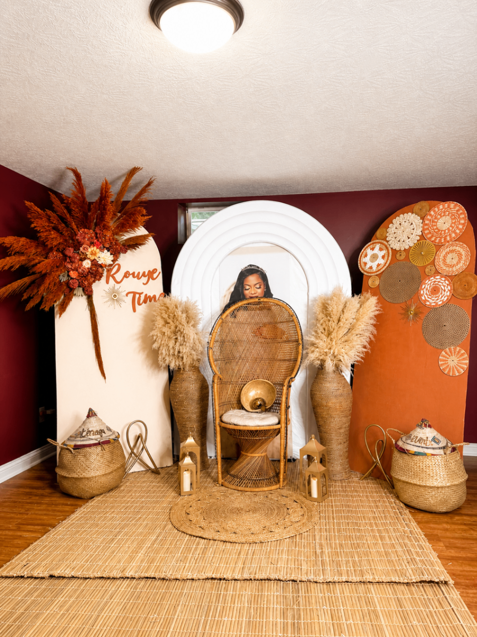 Rouye Time installation with warm earth colors, woven décor, and statement peacock chair.